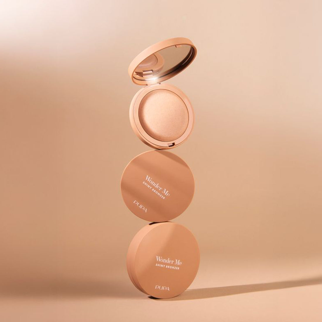 Wonder Me Shiny Bronzer Terra cotta luminosa 001 Light Neutral_PUP050244A001_Pupa-2